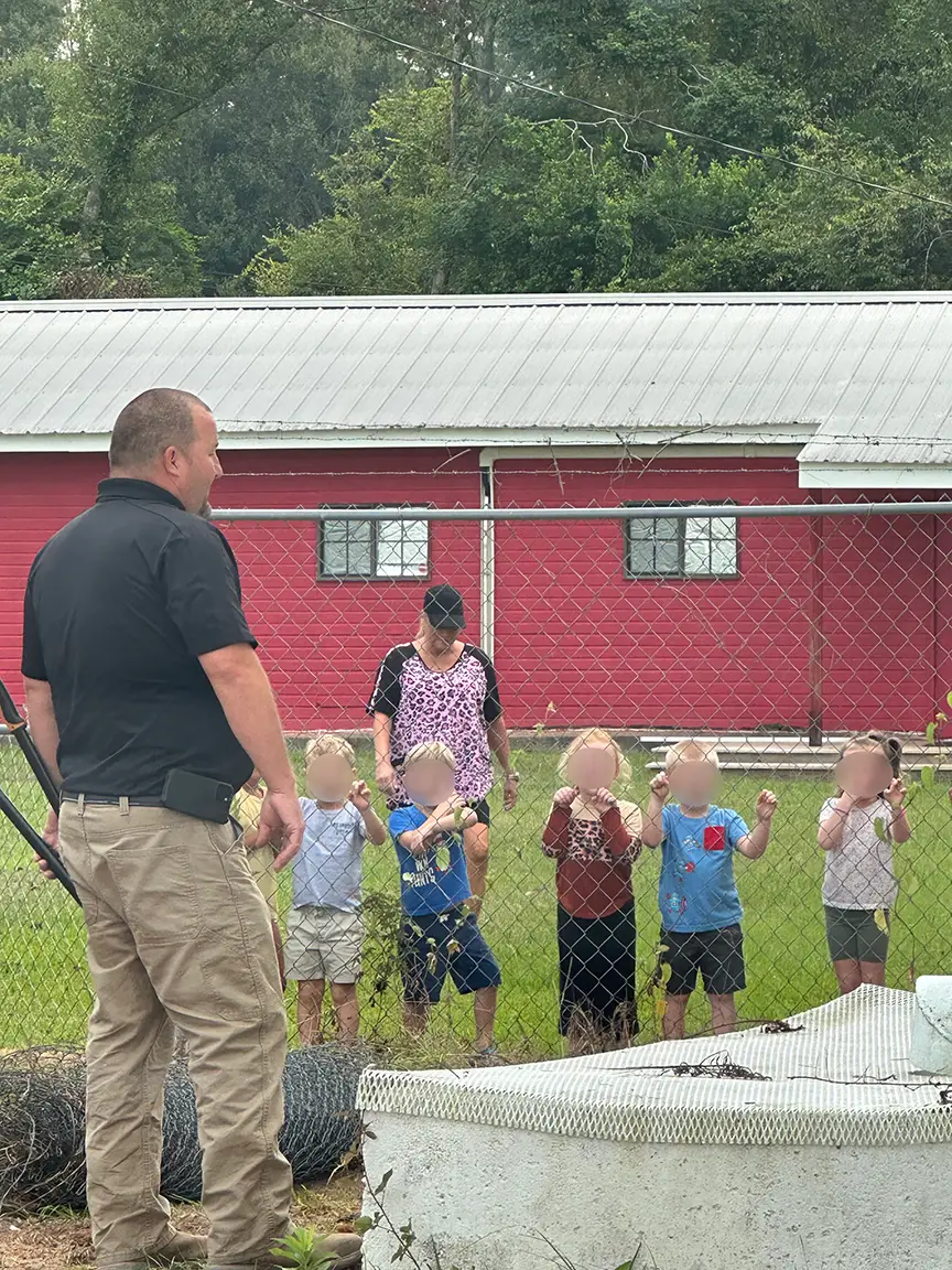 Matt Fountain teaches Petal school kids about water distribution