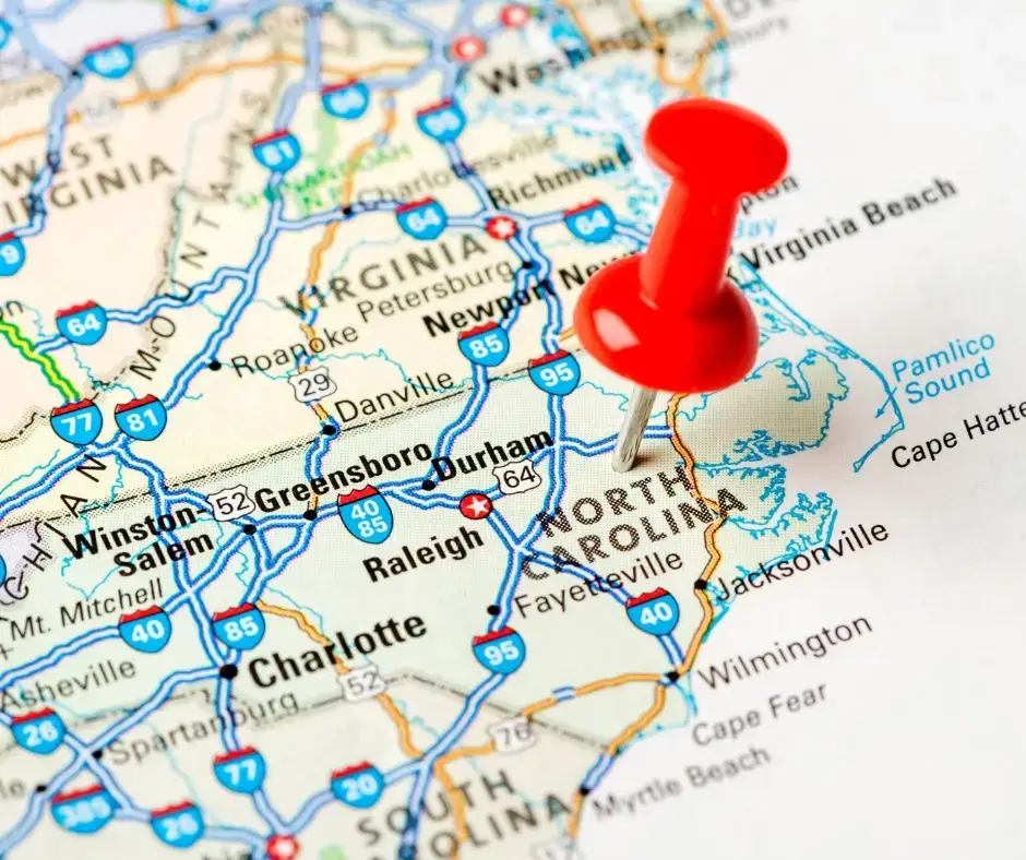 Thumbtack on North Carolina on a map