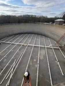 An image of ongoing construction rehab on a wastewater digestor