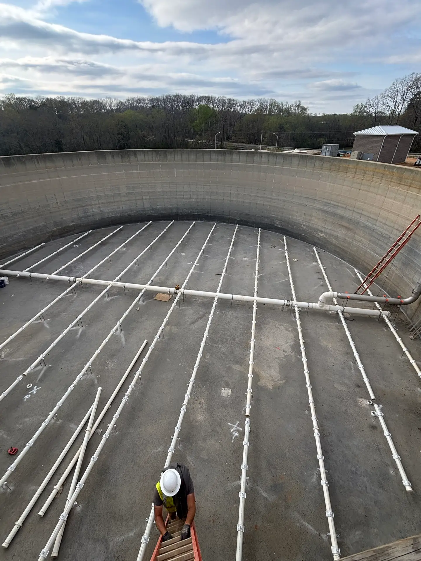 An image of ongoing construction rehab on a wastewater digestor