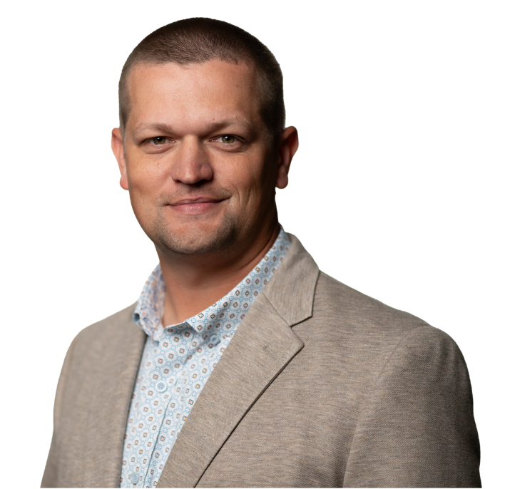 Houston Black, Chief Operating Officer of ClearWater Solutions with a tan jacket on a white background